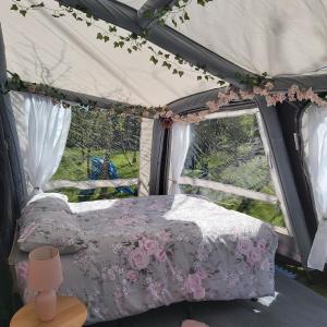 Tentes de luxe Caravane Les Fontenelles : photos des chambres