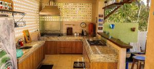 Casa com Piscina e Churrasqueira Cotovelo by Qavi