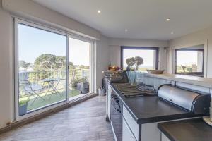 Appartements Appartement vue sur le golf et baie de St Briac : photos des chambres