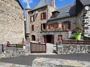 Maisons de vacances Maison typique pleine de charme Peyrusse Cantal : photos des chambres