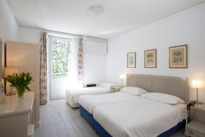 Triple Room with Balcony room in Piccolo Hotel