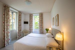 Twin Room with Balcony room in Piccolo Hotel