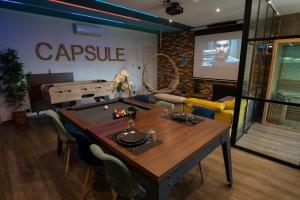 Appartements Capsule Gaming balneo & billard & babyfoot & sauna 2 chambres : photos des chambres