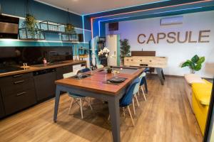 Appartements Capsule Gaming balneo & billard & babyfoot & sauna 2 chambres : photos des chambres