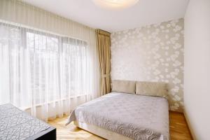 Saulėti apartamentai