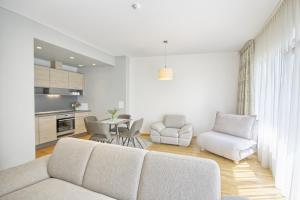 Saulėti apartamentai