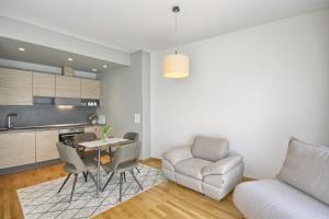 Saulėti apartamentai