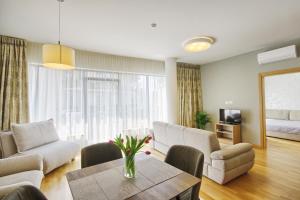 Saulėti apartamentai