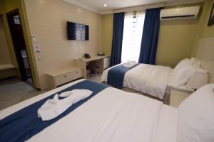 The Caye Hotel Caye Caulker - Ubytování bez kategorie ve městě Caye Caulker