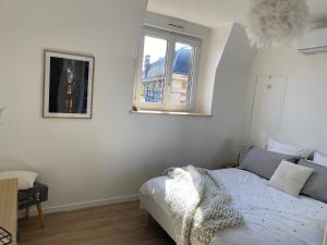 Appartements L’ELEGANT: 80m2 vue sur vignoble au Centre d’Epernay!! : photos des chambres