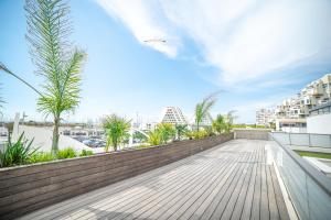 Appartements LUXURY MIND - VUE MER - CENTRE VILLE - PARKING - ROOFTOP - NEUF - CoHoteConciergerie La Grande Motte : photos des chambres