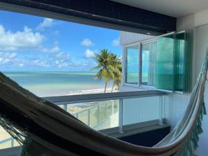 Bela Hospedagem - Flat pé na areia no Bessa com vista incrível do mar