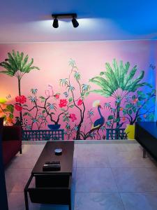 Appartements Pink Tropical Champagne : photos des chambres