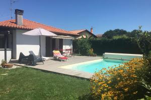 Maisons de vacances Belle maison 3 avec piscine & veranda a Tarnos 10 min plage - Welkeys : photos des chambres