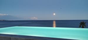 Appartements Pearl Beach - Rooftop Pool Seaside : photos des chambres