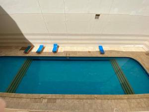 Чудесная студия в комплексе с бассейном рядом с бесплатным пляжем