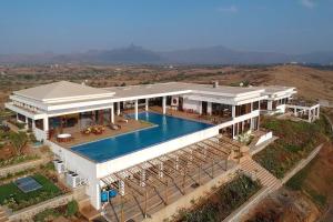 StayVista at Sunset on the Lake - Infinity Lakeview Swimming Pool with Contemporary Interiors & Lavish Amenities