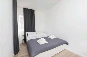 Casa Bianca family apartment near sandy beach with parking and rooftop experience
