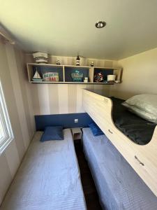 Chalets Mobil-home climatise avec piscine : photos des chambres