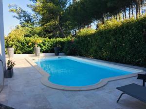 Villas Belle Villa avec Piscine proche Golf : photos des chambres