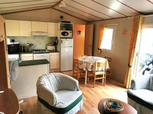 Maisons de vacances Mobil Home L'Evasion : photos des chambres