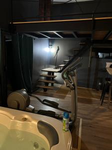 Appartements Charmant logement avec jacuzzi et sauna : photos des chambres