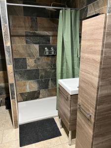 Appartements Charmant logement avec jacuzzi et sauna : photos des chambres