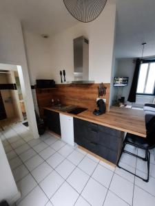 Appartements charmant studio plein centre ville : photos des chambres