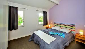 Villages vacances Village Nature et Ocean a cote de la plage avec piscine et jacuzzi : photos des chambres