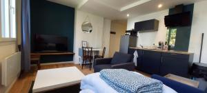 Appartements T2 Cosy proche Gare et Centre Ville - Parking Gratuit a proximite : photos des chambres