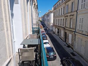 Appartements Meubles de l'Arsenal coeur de ville ! : photos des chambres