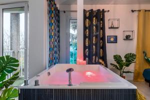 Maisons de vacances Suite SPAradise - SPA Prive - 6min Disneyland PARIS : photos des chambres