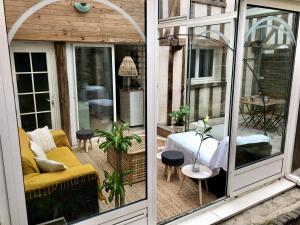 Appartements T2 style cottage - Veranda & Terrasse exterieure : photos des chambres