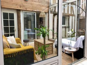 Appartements T2 style cottage - Veranda & Terrasse exterieure : photos des chambres