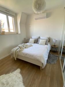 Appartements L’ELEGANT: 80m2 vue sur vignoble au Centre d’Epernay!! : photos des chambres