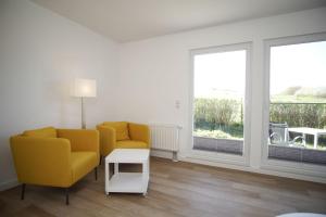 Ferienwohnung mit Terrasse in ruhiger Lage - Haus Südperd FeWo Dünenrose