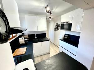 Appartements L’ESCALE : photos des chambres