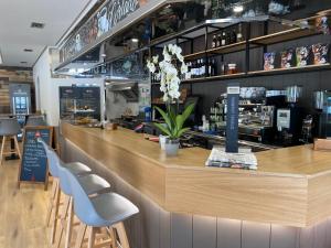 Saudade Hostal Cafetería