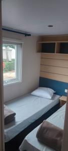 Campings Camping l'europe, mobile home 6 personnes : photos des chambres