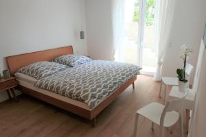 REBHAUS Ferienwohnung Winzergarten