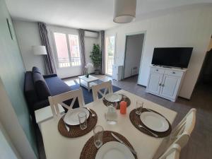 Appartements L'Arbousier - Piscine & climatisation : photos des chambres