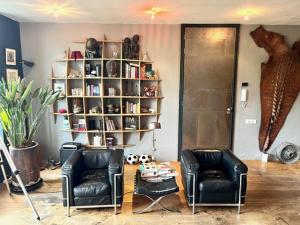 Elegant penthouse LOFT of 250 m2 in city centre with huge roofgarden 80 m2