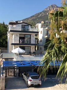 Stone House Aparts 2 plus 1 mit zwei Balkone und Poolview Kalkan No 10
