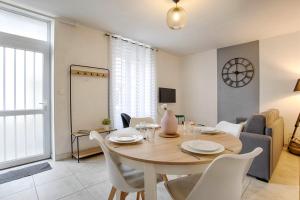 Appartements Le Grand Appart' proche commerces : photos des chambres