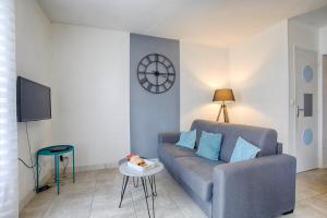 Appartements Le Grand Appart' proche commerces : photos des chambres