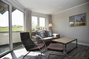 strandnah mit Balkon, gratis Nutzung vom AHOI Erlebnisbad und Sauna in Sellin - Strandhaus Mönchgut FeWo11