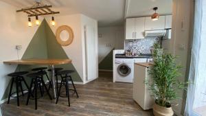 Appartements RETOUR AUX SOURCES : photos des chambres