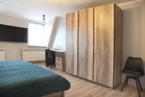 Apartamenty NA PODDASZU