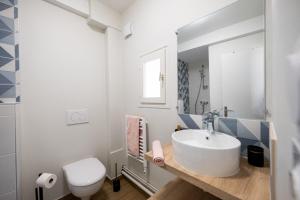 Appartements Les Orchidees : photos des chambres