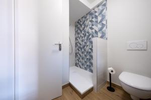 Appartements Les Orchidees : photos des chambres